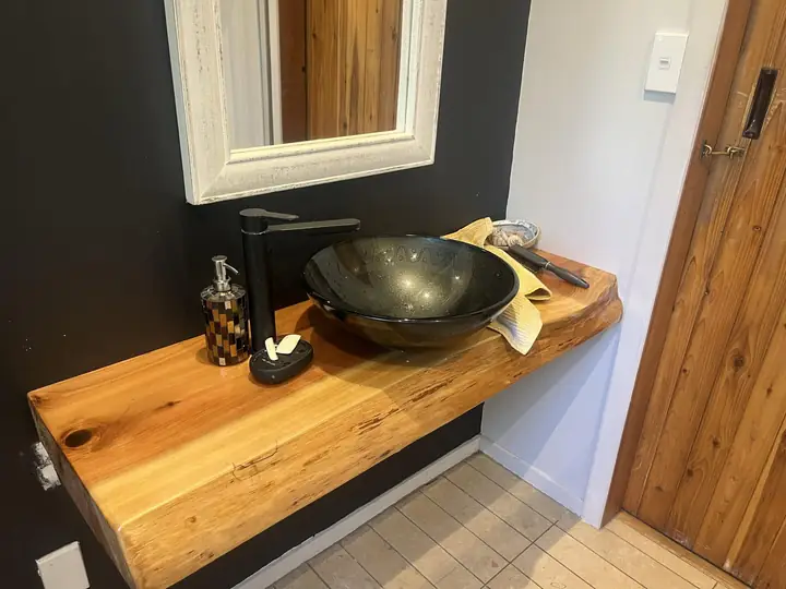 Bathroom with timber slab vanity