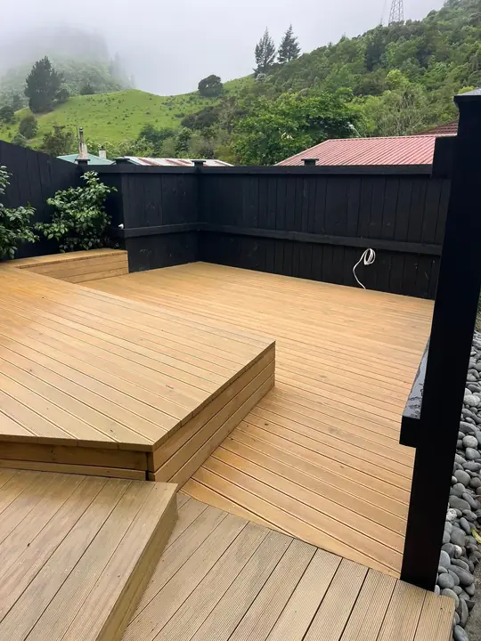 Two level deck with black fence