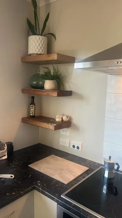 Timber floating shelves in a kitchen